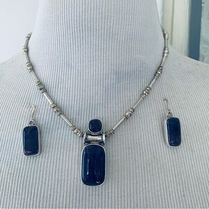 Silver handmade by Artist necklace and earrings with purple stone